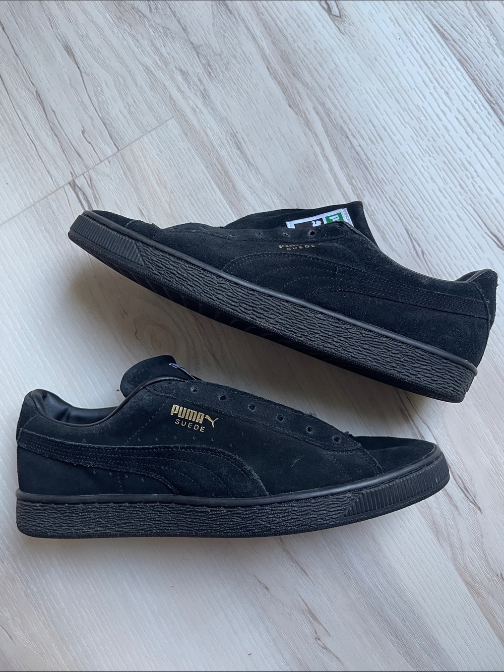 Puma Suede Men's Black Sneakers with Gold Branding